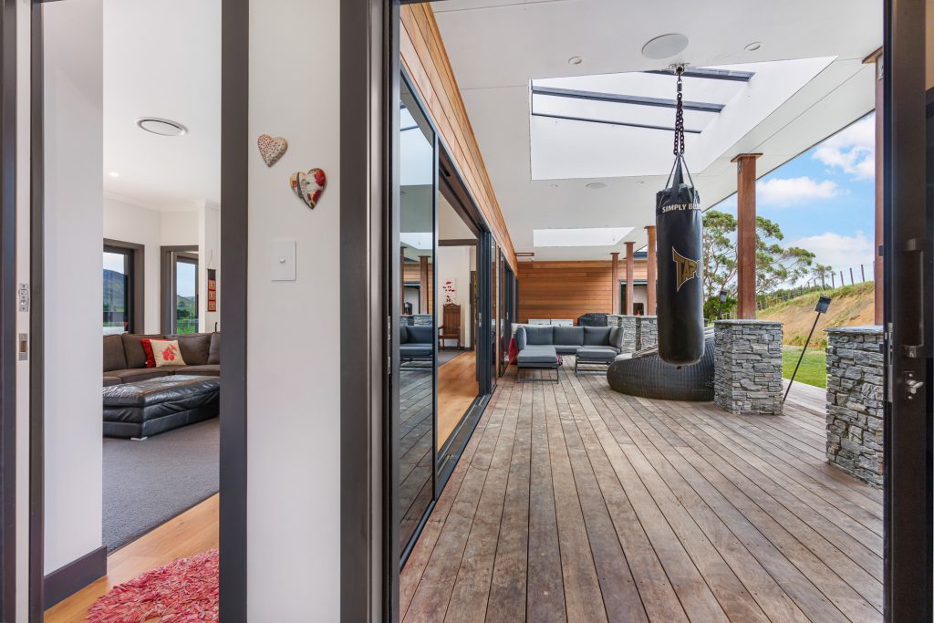 Hallway leading through an architectural home